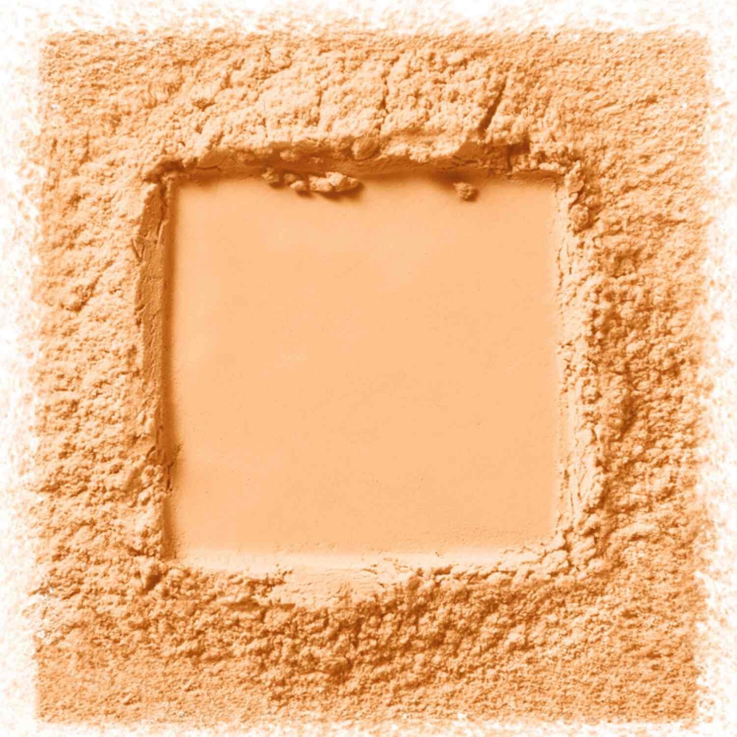 Carré jaune de Fit Me Loose Powder entouré de poudre libre