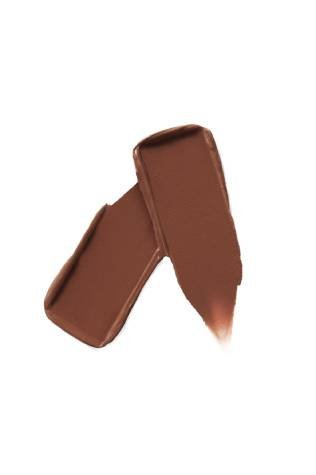 Un rouge à lèvres Serum Lipstick de Maybelline New York ouvert, capot retiré, présenté sur un fond blanc.